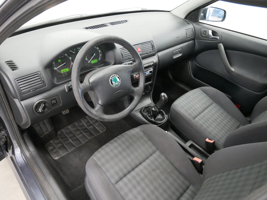 Škoda Octavia 1.6 MPi 75 kW Tour – foto 14